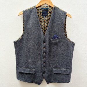 Ted Baker vest with grey wool, front pockets, and pocket square. Ted size of 5
